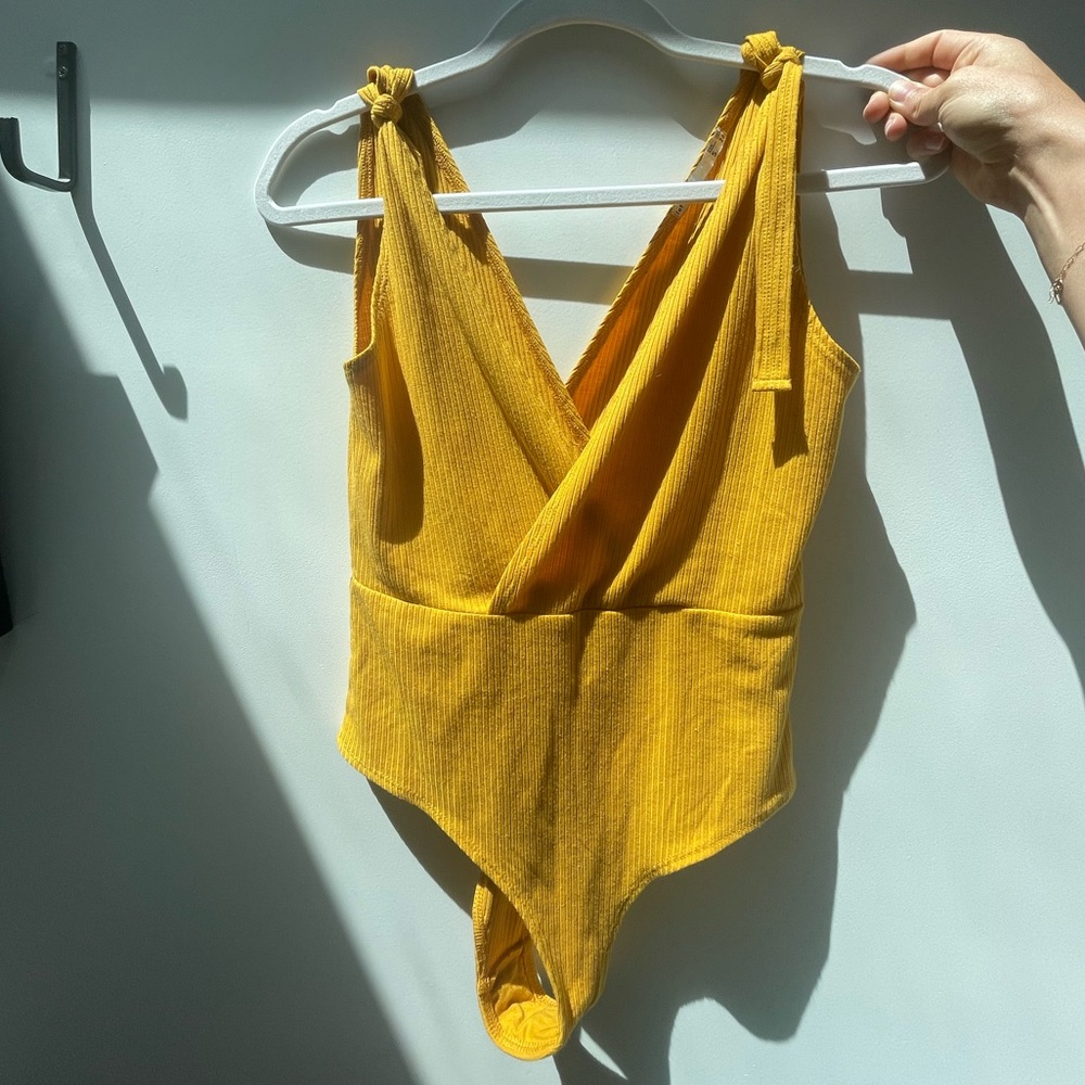 Lefties Size S Adjustable Tie Strap Bodysuit
Mustard Yellow